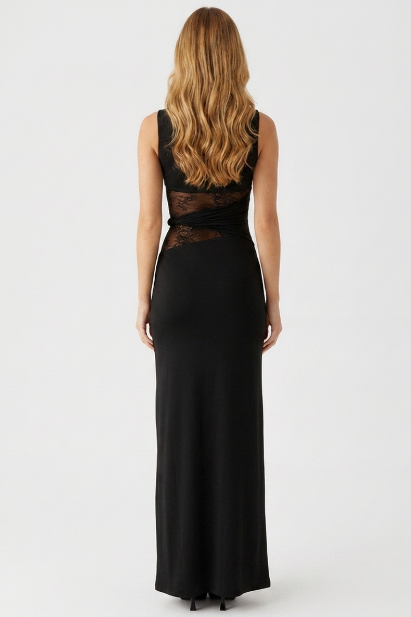 Black evening gown with lace detailing on a white background