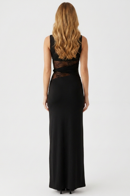 Black evening gown with lace detailing on a white background