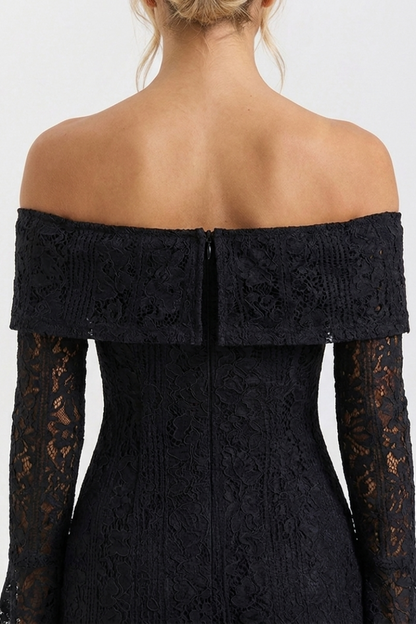 Black lace off-shoulder dress on a white background